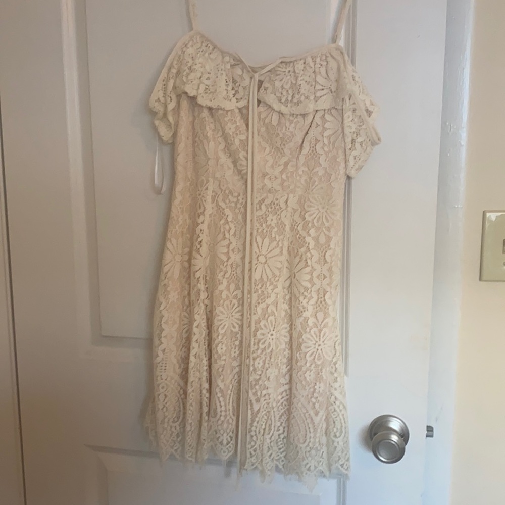 Size 3/4, cream lacey dress off the shoulder.
